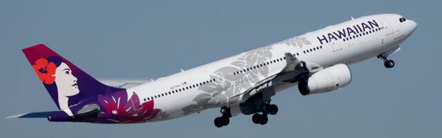 A Hawaiian Airlines flight declared an emergency after a passenger's phone got stuck in a seat and produced an 'electrical smell'