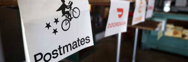 Postmates cuts losses in Q2 as it heads towards tie-up with Uber