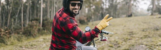 What It Means When A Motorcyclist Flashes You The Peace Sign