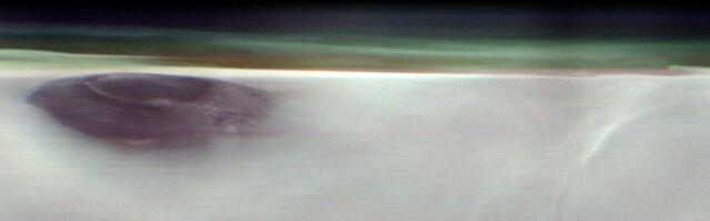 Mars Orbiter Captures Rare View of Ancient Volcano Poking Above the Clouds